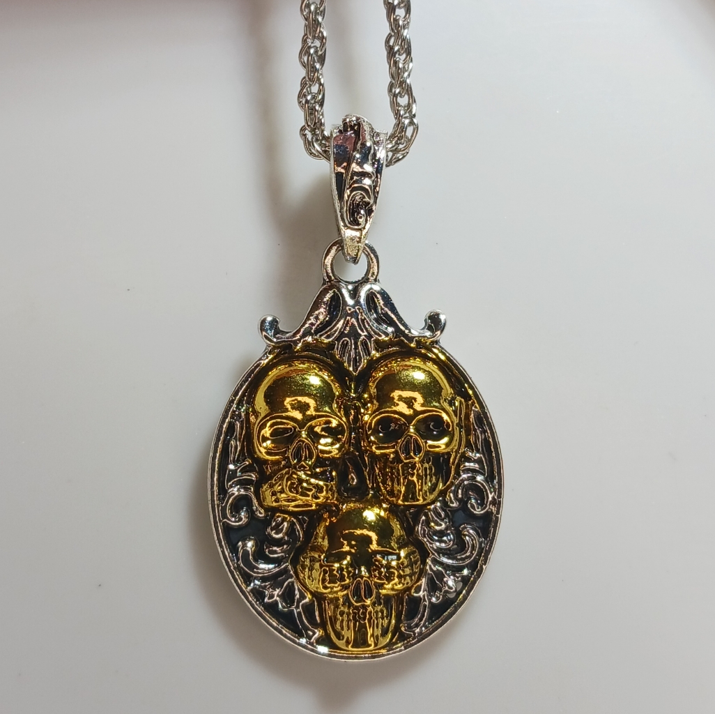 Gold Skulls  Silver Tone With Gold Tone Skulls